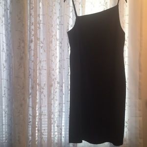 Black dressed, spaghetti strap.